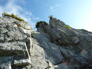 Ⅵ峰Ｃフェース剣稜会ルート４ピッチ目を登攀中のU田君